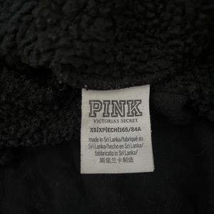 Pink sweatshirt. Black size xs